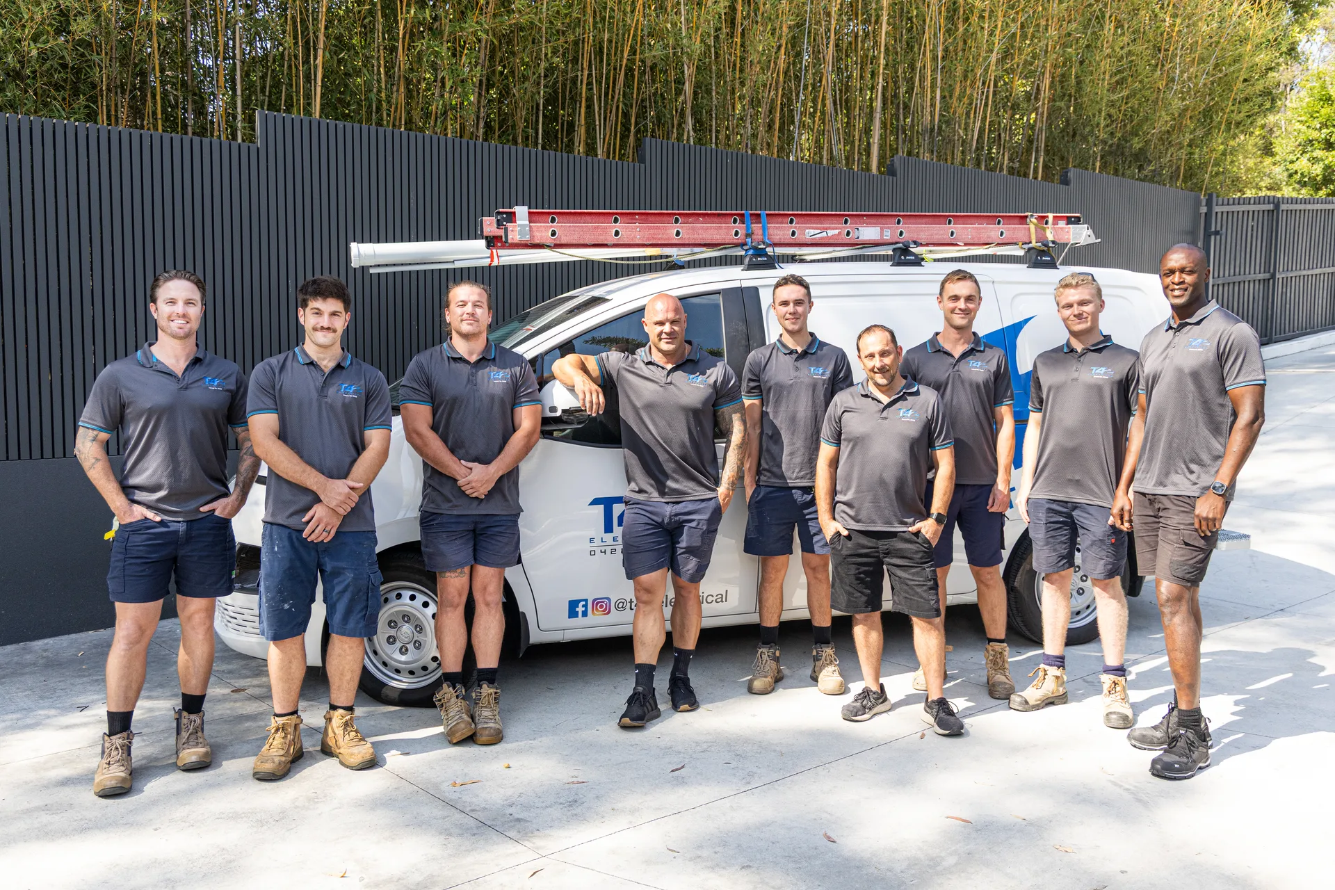 The Family Electrician Worongary team with a service van